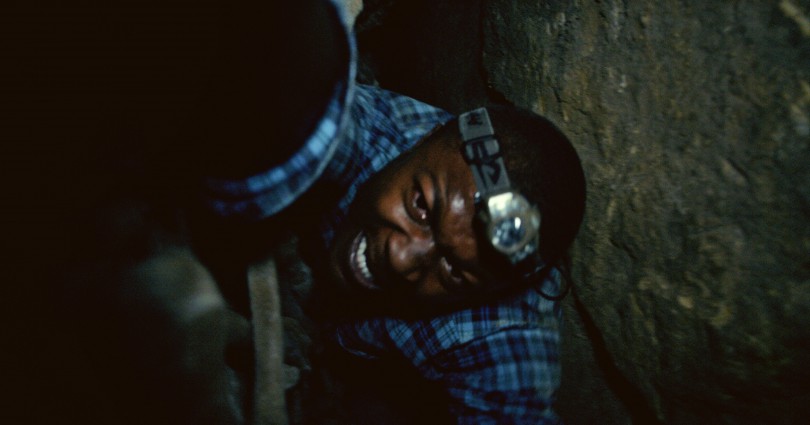 Benji (EDWIN HODGE) is trapped in the twisting catacombs beneath the streets of Paris in As Above/So Below.