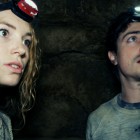 Scarlett (PERDITA WEEKS) and George (BEN FELDMAN) traverse miles of twisting catacombs beneath the streets of Paris in As Above/So Below.