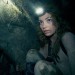 Scarlett (PERDITA WEEKS) traverses miles of twisting catacombs beneath the streets of Paris in As Above/So Below.